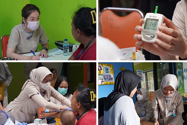 Tim medis GWS Medika tengah memeriksa warga Rusun Bendungan Hilir.